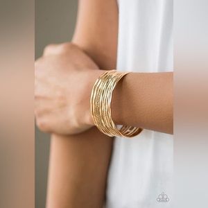 Paparazzi Goldtone cuffed bracelet.